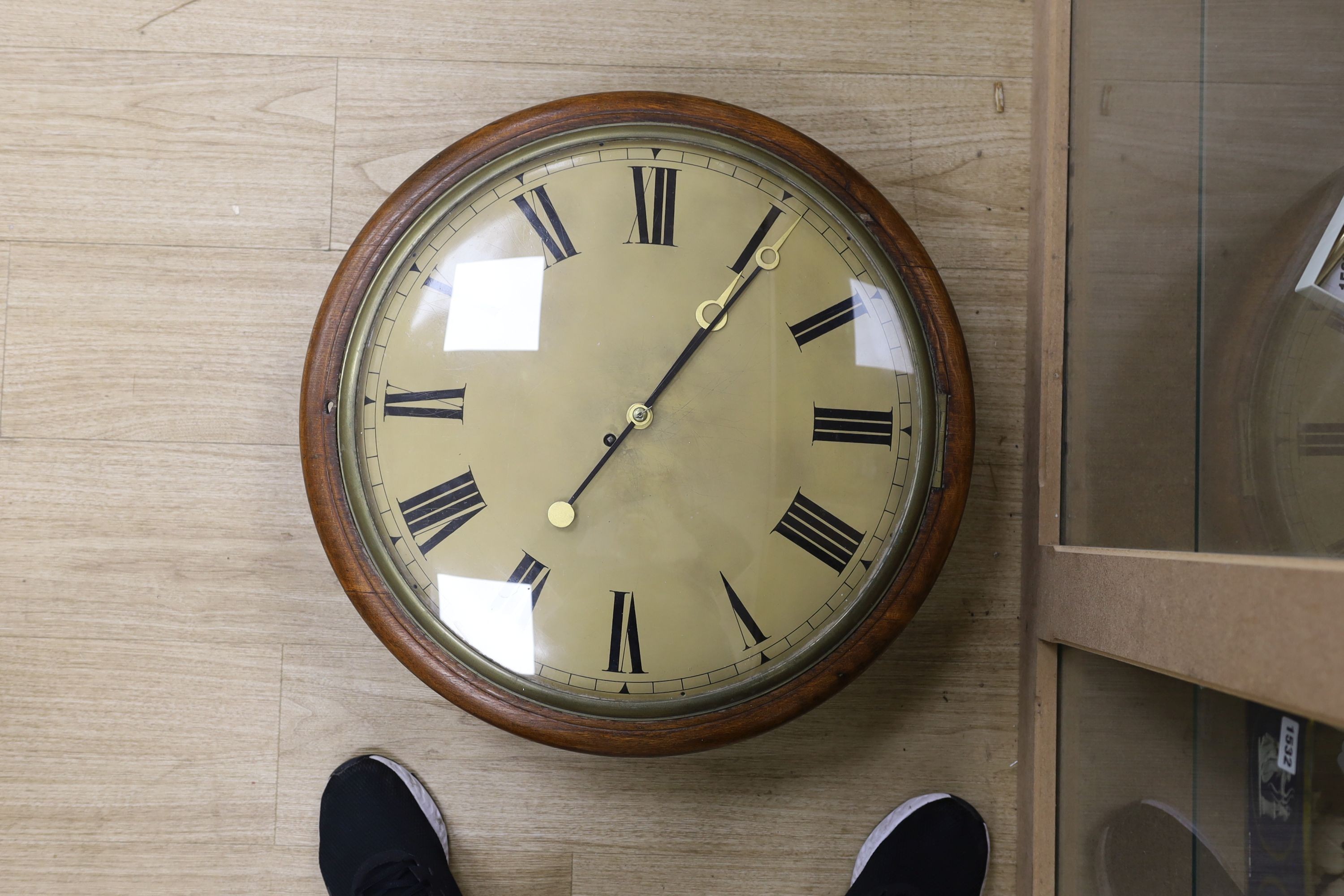 A large Victorian oak-cased dial clock, 56 cms diameter.